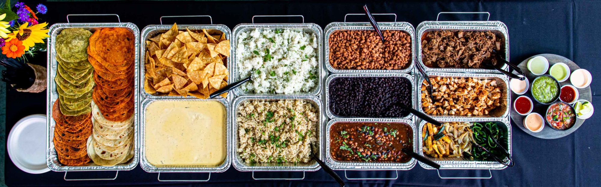 Catering trays filled with food.
